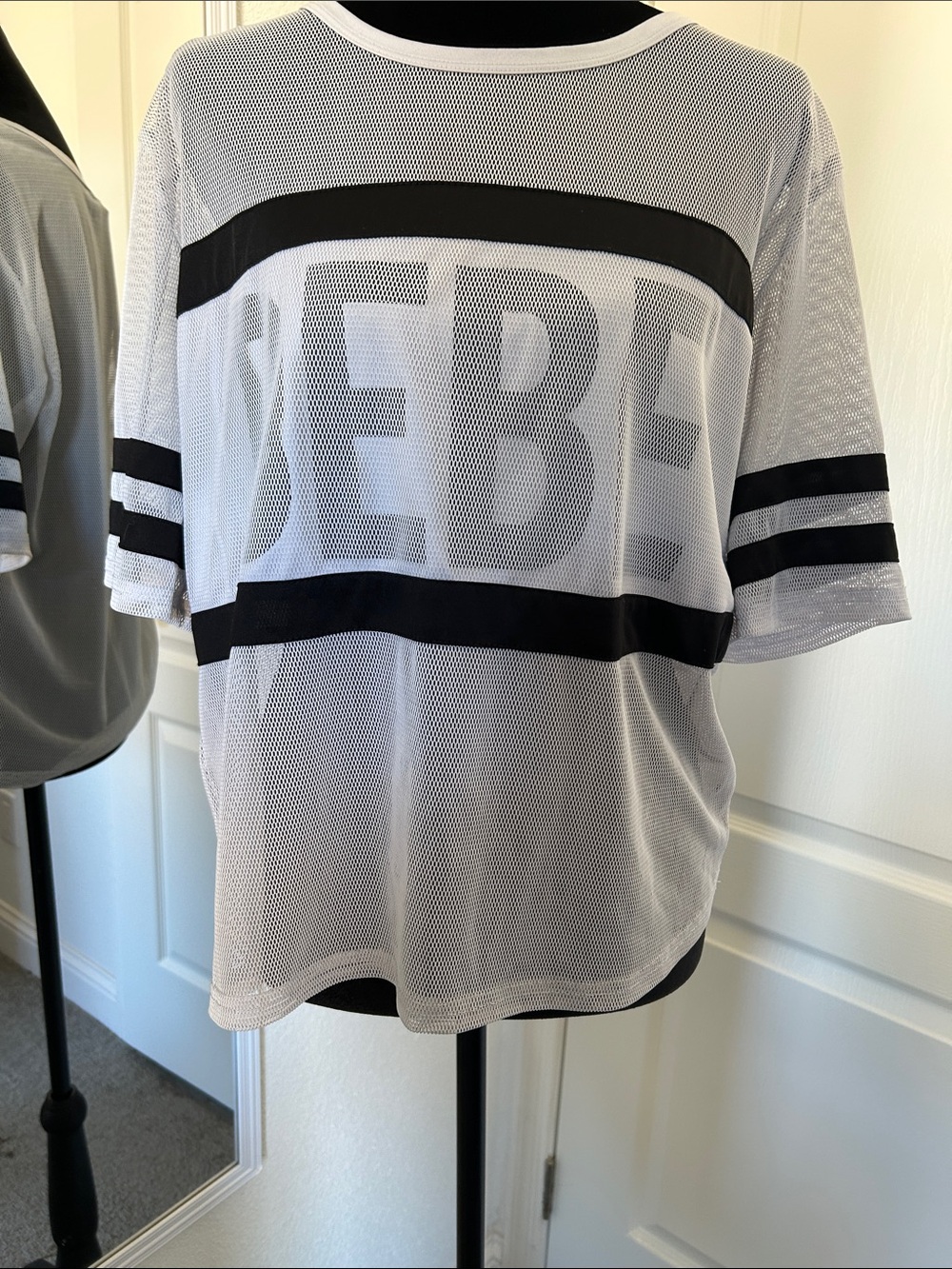 bebe White Mesh Short Sleeve Jersey with Black Stripes